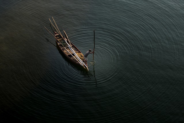 Traditional fishing boat on a calm lake